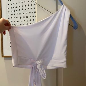 One shoulder white top
